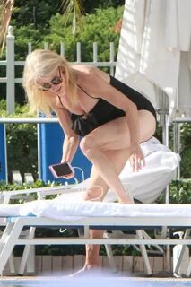KELLYANNE CONWAY in Swumsuit at a Pool in Miami 11/28/2016. 