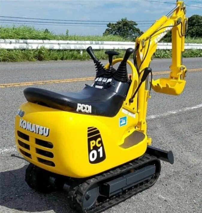 Komatsu мини экскаватор pc01. Эксковатор яаонец мини Каматсу. Diverto qs100 экскаватор. Мини экскаватор Wilgen 100.