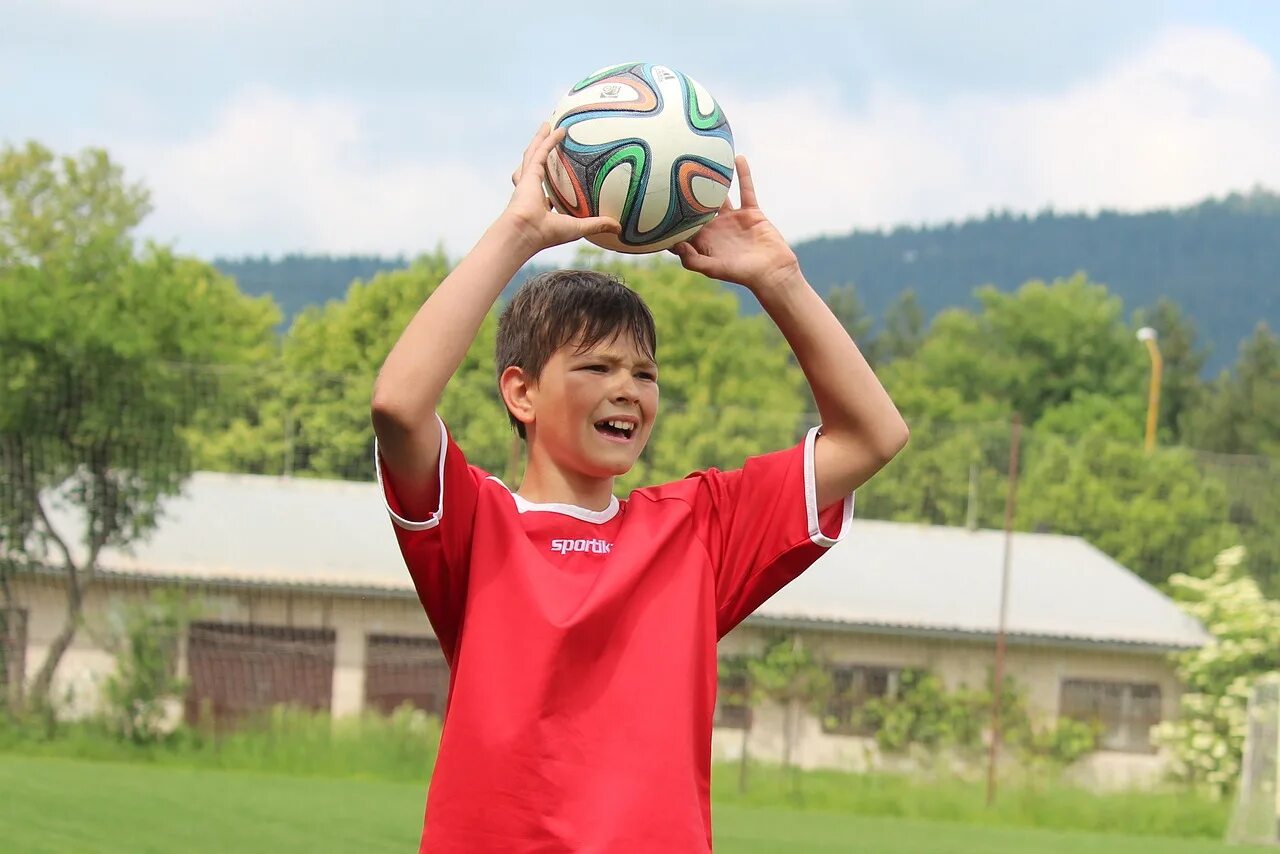 Peter started to play football because. Дети футболисты. Мальчик с мячом. Мальчик футболист. Мяч для детей.