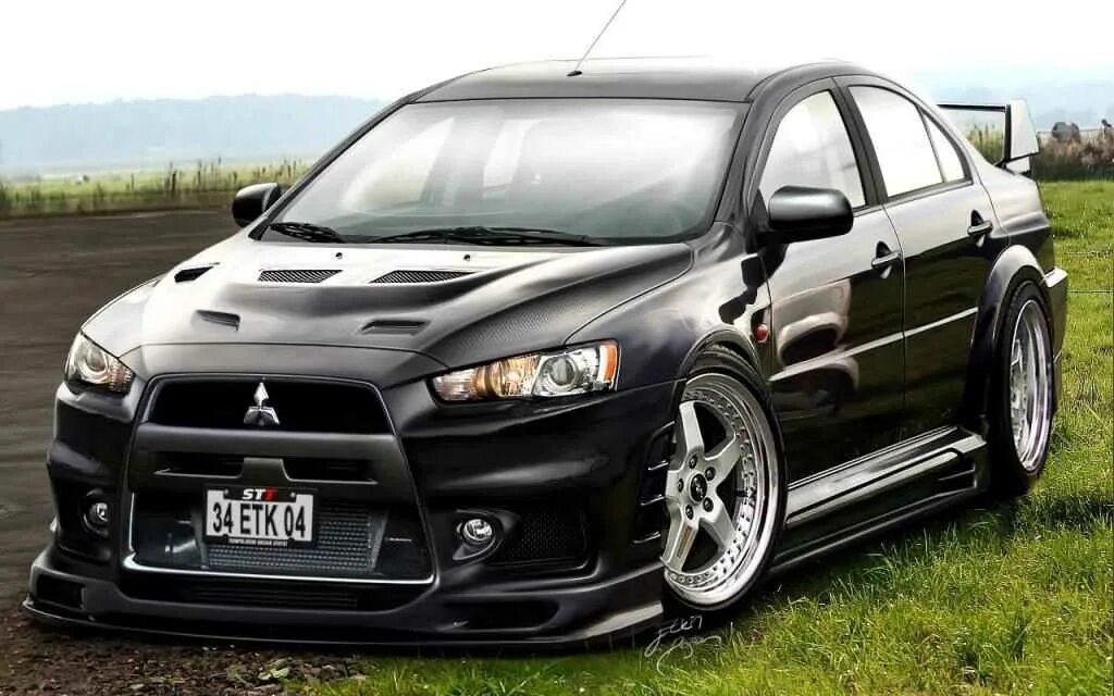 Mitsubishi evo x. Митсубиси Лансер эволю. Митсубиши Лансер 10 Эво. Lancer Evolution 10. Лансер 10 Эволюшн.