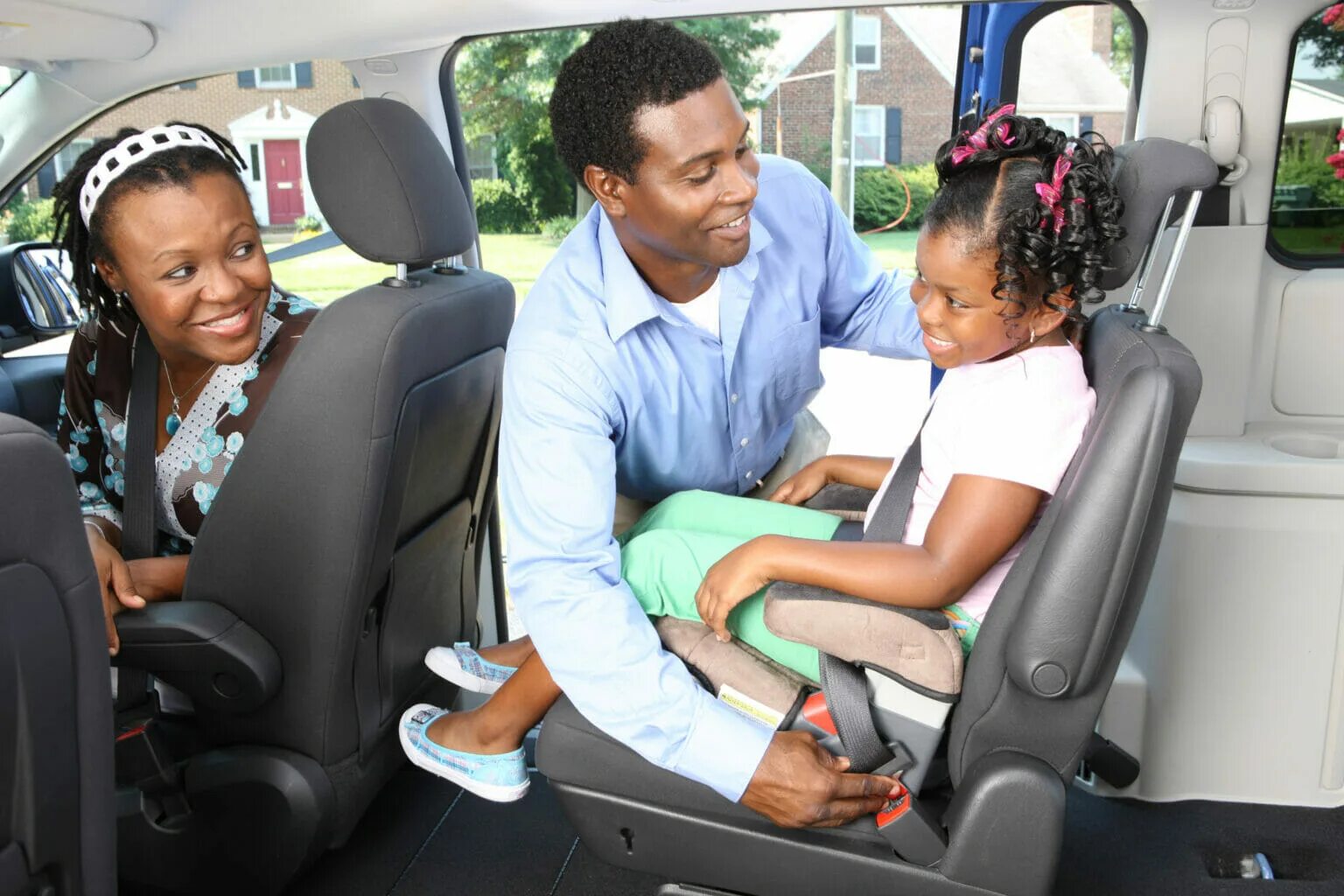 Children in car Seats. Child sitting in Baby Safety Seat. Children in the back Seat of the car. Child Passenger in a car.