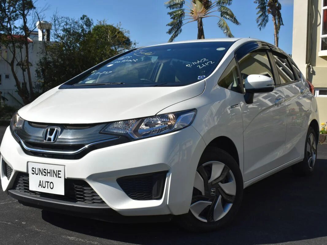 Honda Fit 2014. Honda Fit Hybrid. Honda Fit гибрид. Хонда фит гибрид 2014 года.