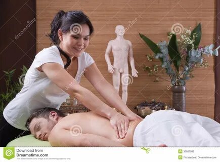 Hands of women making massage - men at spa - time for relax.