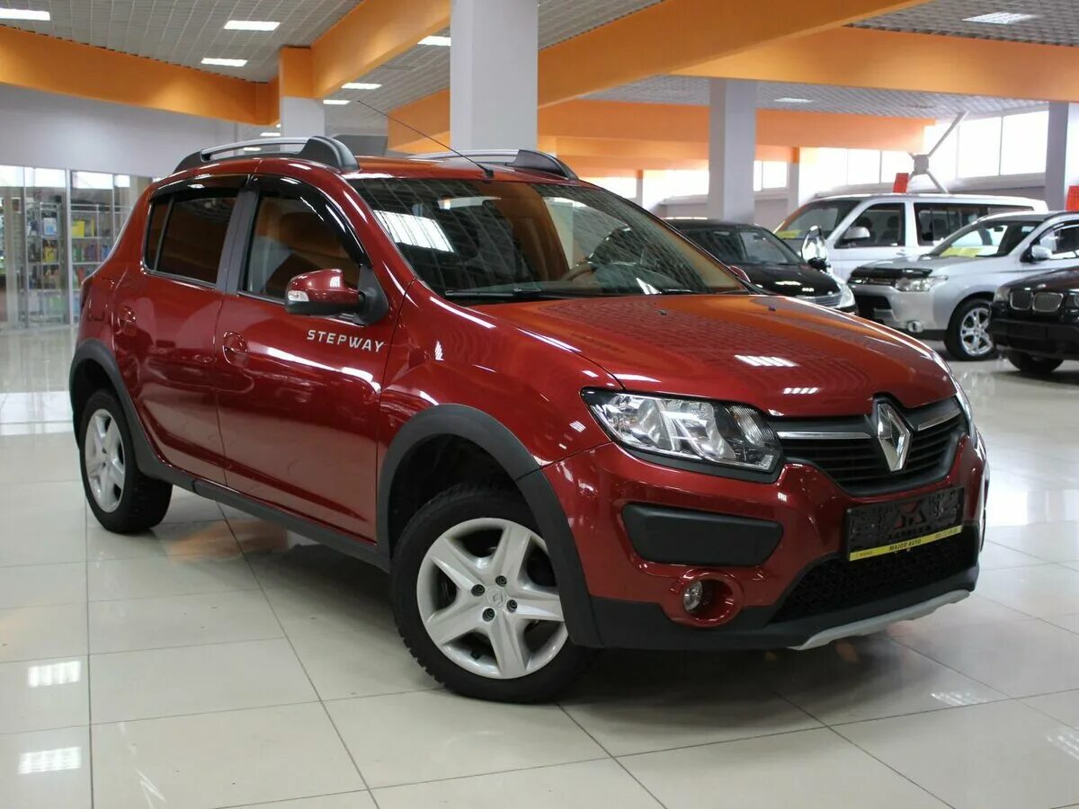 Renault Sandero Stepway красный. Рено Сандеро степвей 2021 красный. Рено Сандеро степвей 2016. Renault Sandero Stepway 1 6 красный.