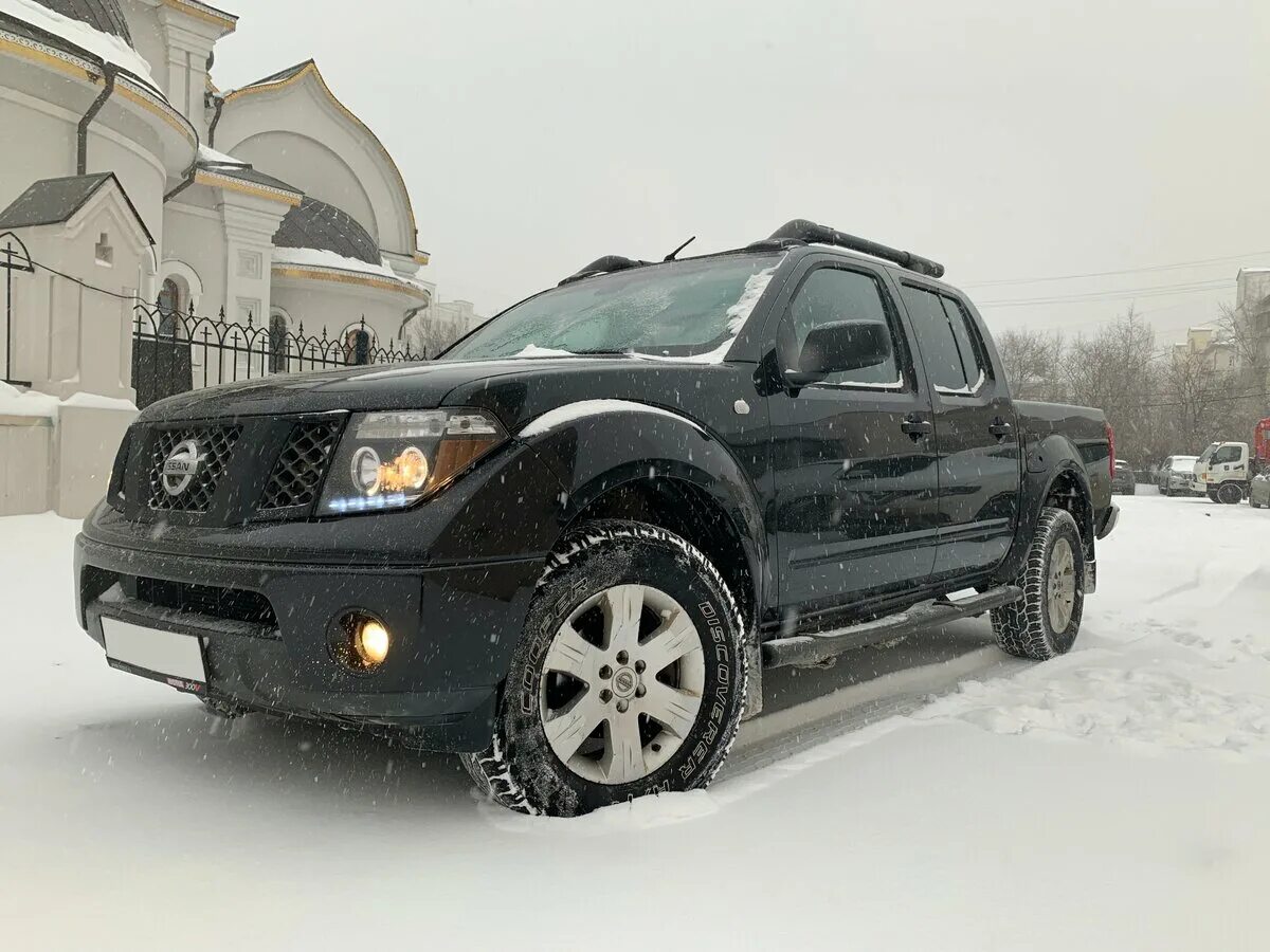 Купить ниссан навара дизель. Nissan Navara 2006. Nissan Navara 2006 черный. Nissan Navara 2006 год 2.5 дизель. Ниссан Навара пикап 2006.