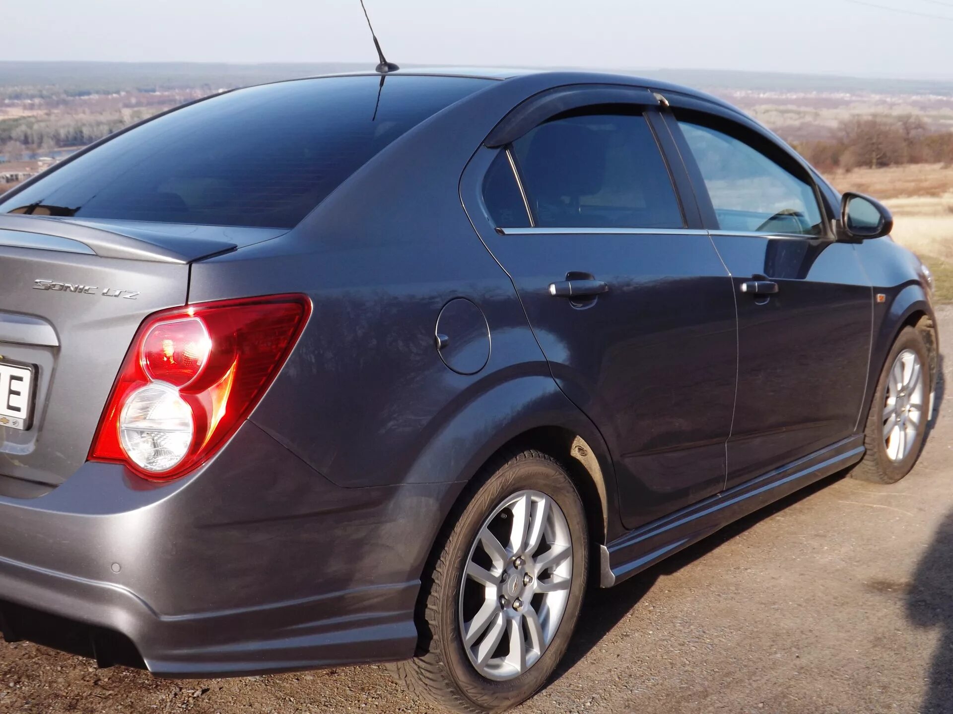 Chevrolet Aveo t300. Шевроле Авео т300 седан. Спойлер на Шевроле Авео т300 седан. Спойлер Chevrolet Aveo хэтчбек t300. Авито курск купить шевроле