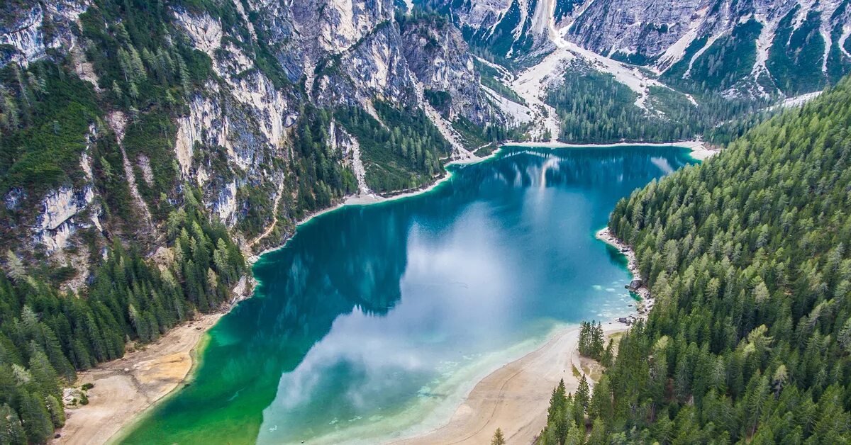 Доломиты италия озеро. Озеро доломитное белорецк. Marmolada гора фото. Узункол доломиты маршруты. Доломитовые альпы озеро брайес.