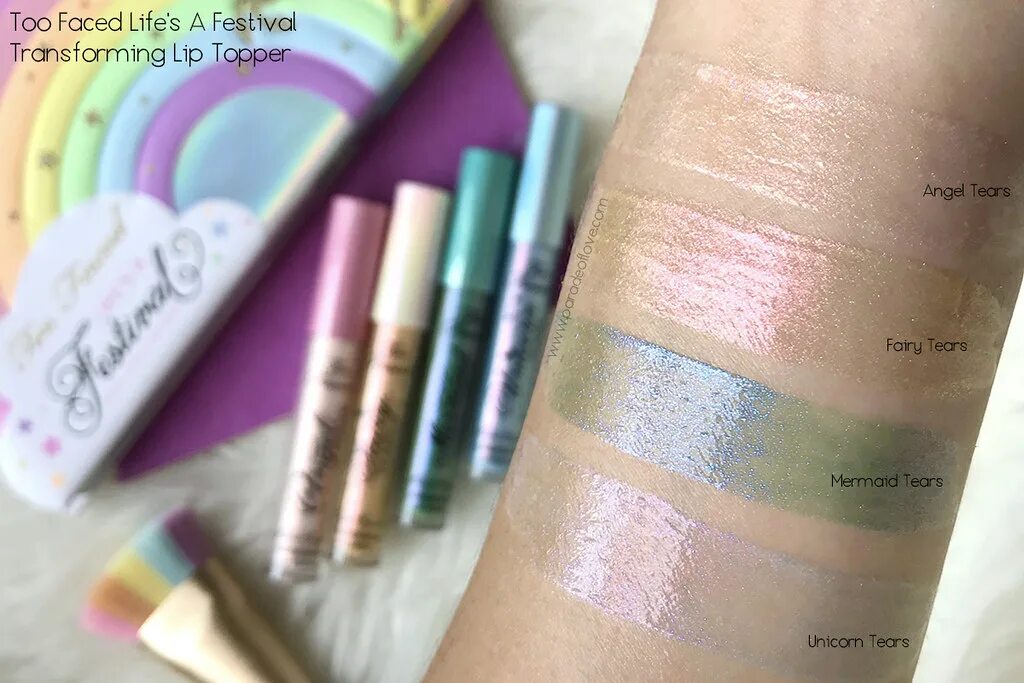 To faced life is. Бронзер too faced Unicorn tears Holographic. Too faced Life is a Festival. Too faced Angel tears. Too faced в Радужном оттенке Unicorn tears печатная реклама.