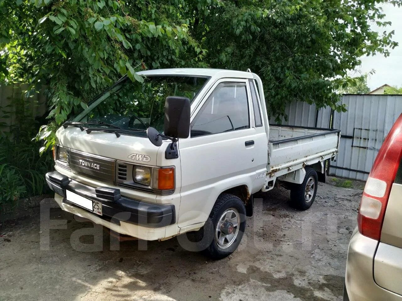 Грузовик тойота приморский край. Toyota Town Ace Truck 4wd. Toyota Lite Ace Truck 4wd. Toyota Town Ace Truck 4x4. Тойота Таун айс 1989 грузовик.