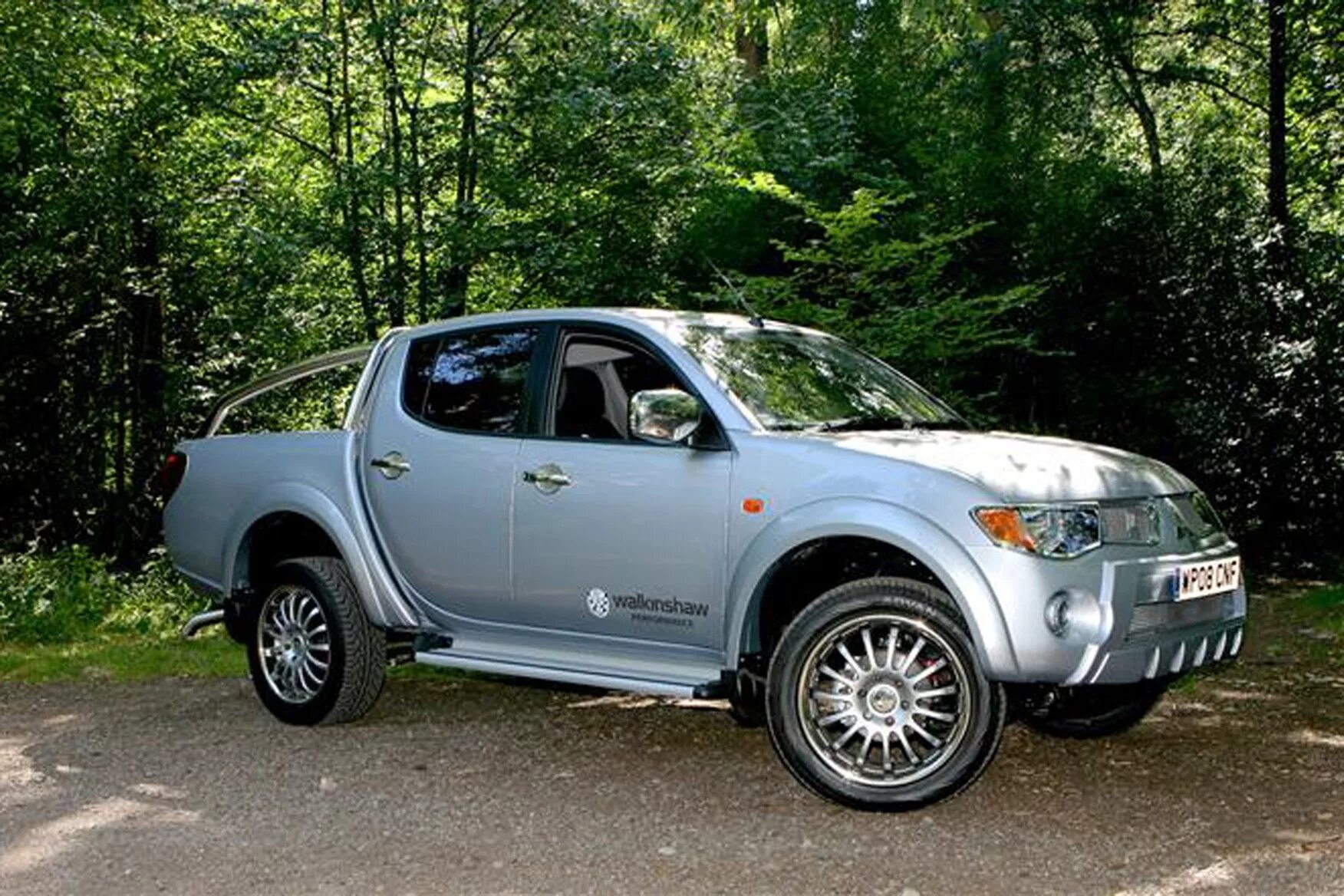 Mitsubishi l200 2005. Мицубиси l200. Митсубиси l200 2006. Мицубиси л200 2006. Пикап Митсубиси л200.