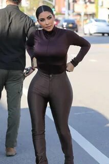 Kim Kardashian Wears Plunging Bodysuit to Lunch with Kourtney