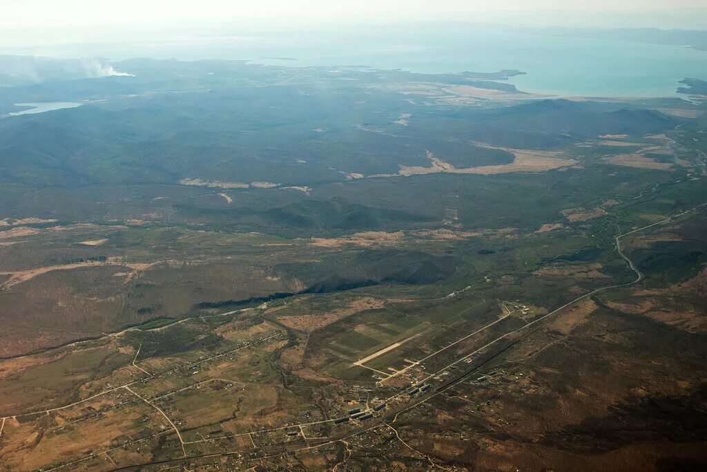 Погода южный приморский край. Село Новонежино Приморский край. Новонежино аэродром. Посёлок Новонежино Приморский край Шкотовский район. Озера поселка Новонежино.