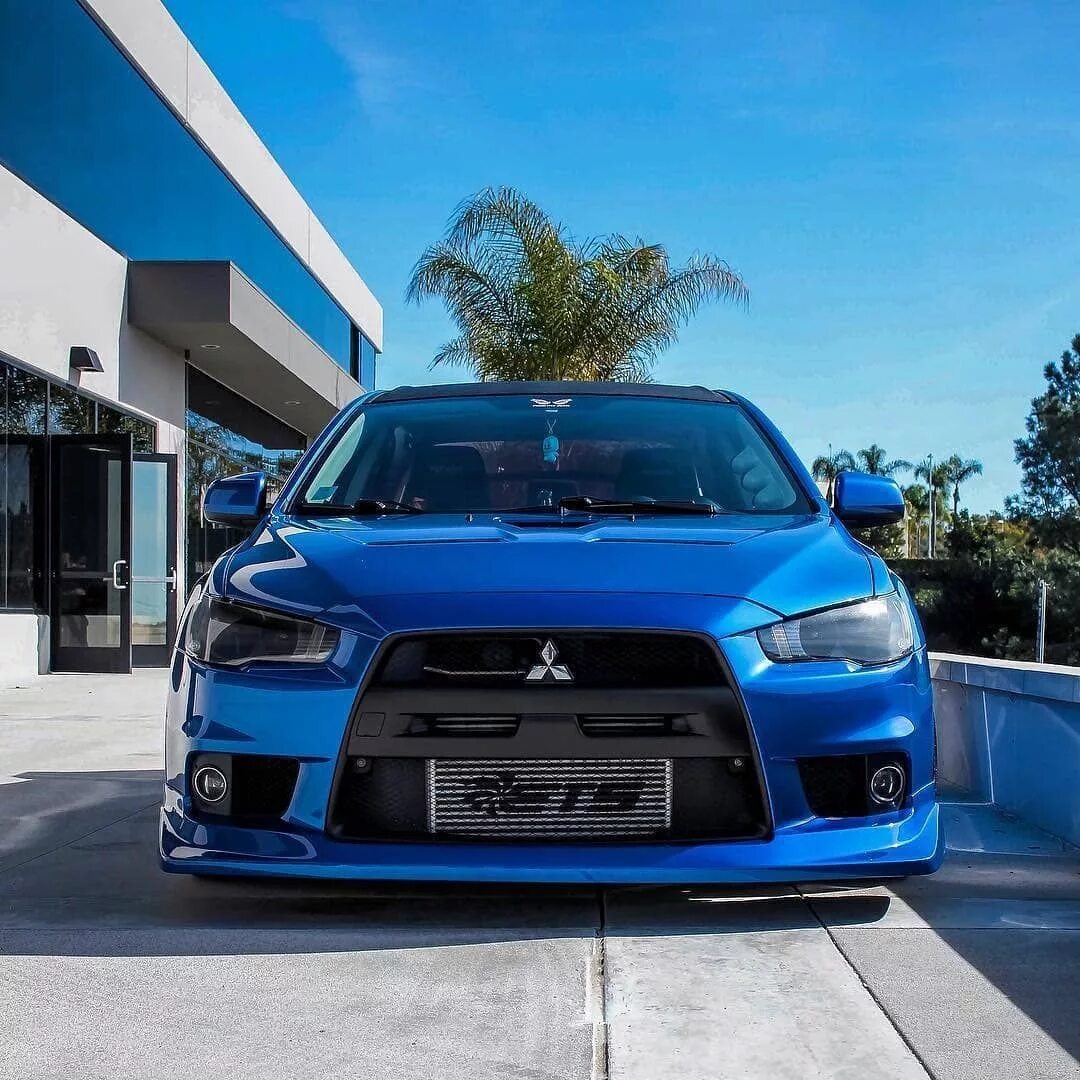 Mitsubishi evo x. Mitsubishi EVO 10. Митсубиси Лансер 10 EVO. Митсубиси Лансер 10 Эволюшен. Mitsubishi Evolution 10.