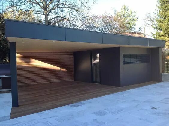 Modern carport in Moscow, Russia. Wooden lamellas made of larch, flat roof. The 