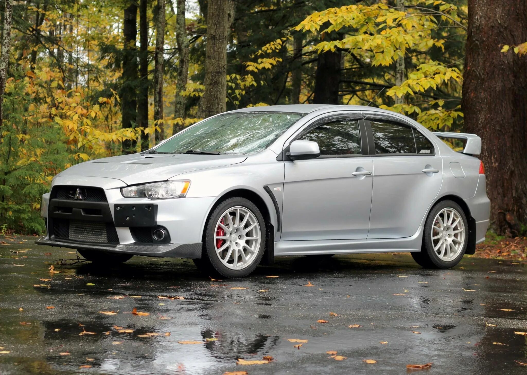 Сколько стоит ланцер. Митсубиси Лансер 10. Mitsubishi Lancer Эво 10. Митсубиши Лансер эко 10. Митсубиси ланцер 10 ЭВА.