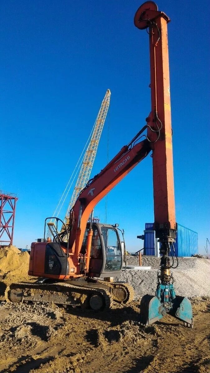 Экскаватор предложение. Hitachi 135. Хитачи 330 экскаватор с грейфером. Экскаваторы с грейферным ковшом Hitachi. Техника для вынимания грунта.