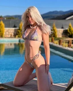 Kristina Chernaleva Displays Her Flawless, Pearl-Like Skin with Elegance.