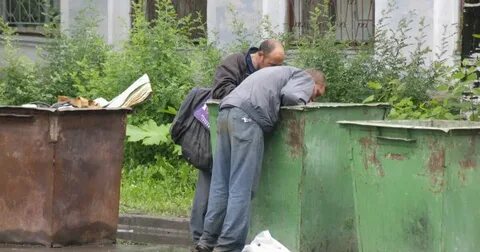 Возле мусорного бака