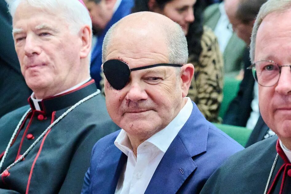 Что было с глазом у шольца