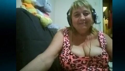 Dirty-minded fat woman shows off her massive boobies.