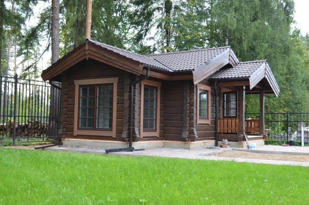 Охотничий проект. Охотничий домик проект. охотничий домик из бруса. дом из лафета. коричневый деревянный дом.