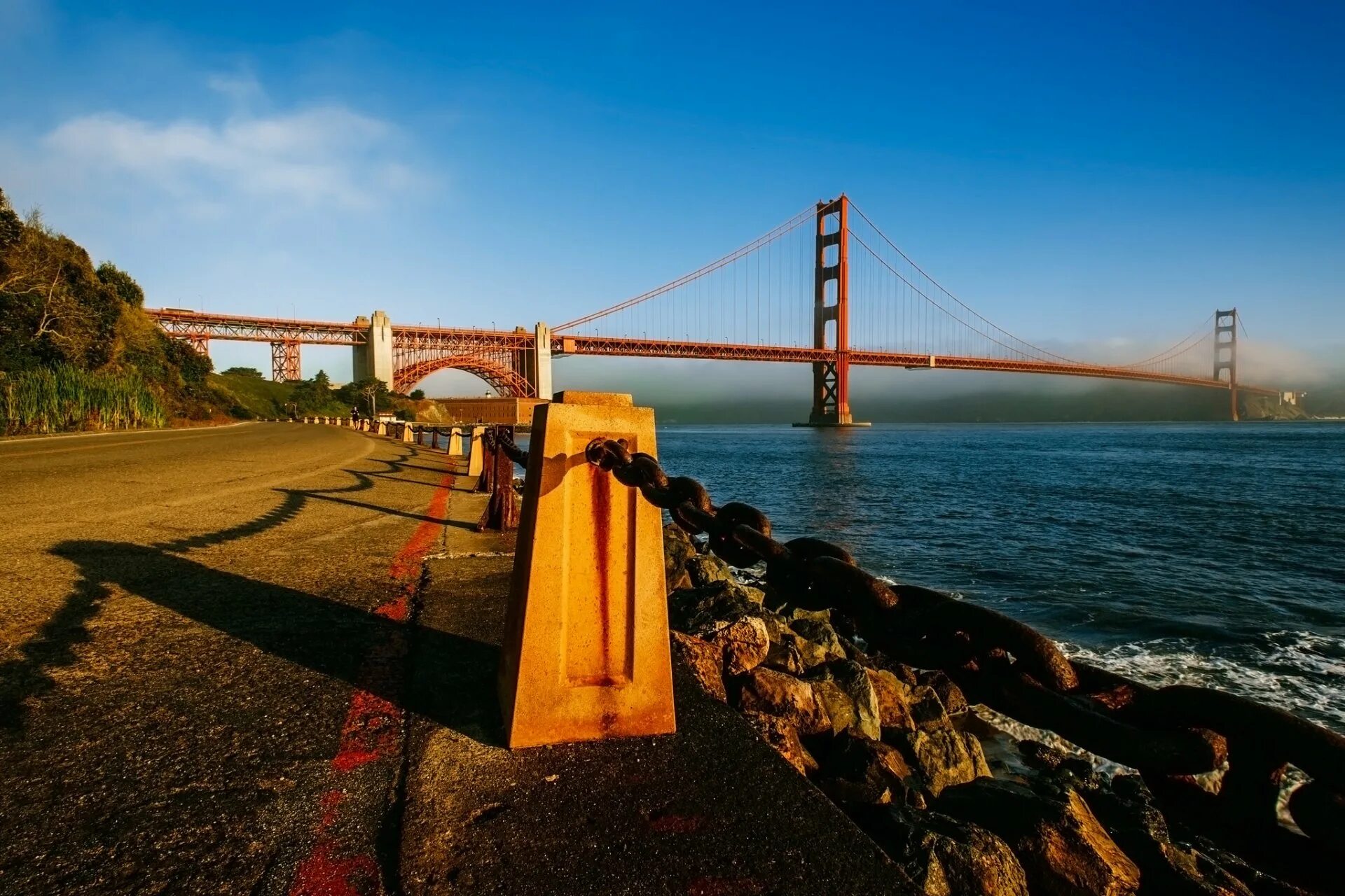 Американский мост. Золотые ворота Сан-Франциско. Мост Сан Франциско. Сан Франциско мост и город. Мост золотые ворота Сан-Франциско дорога.