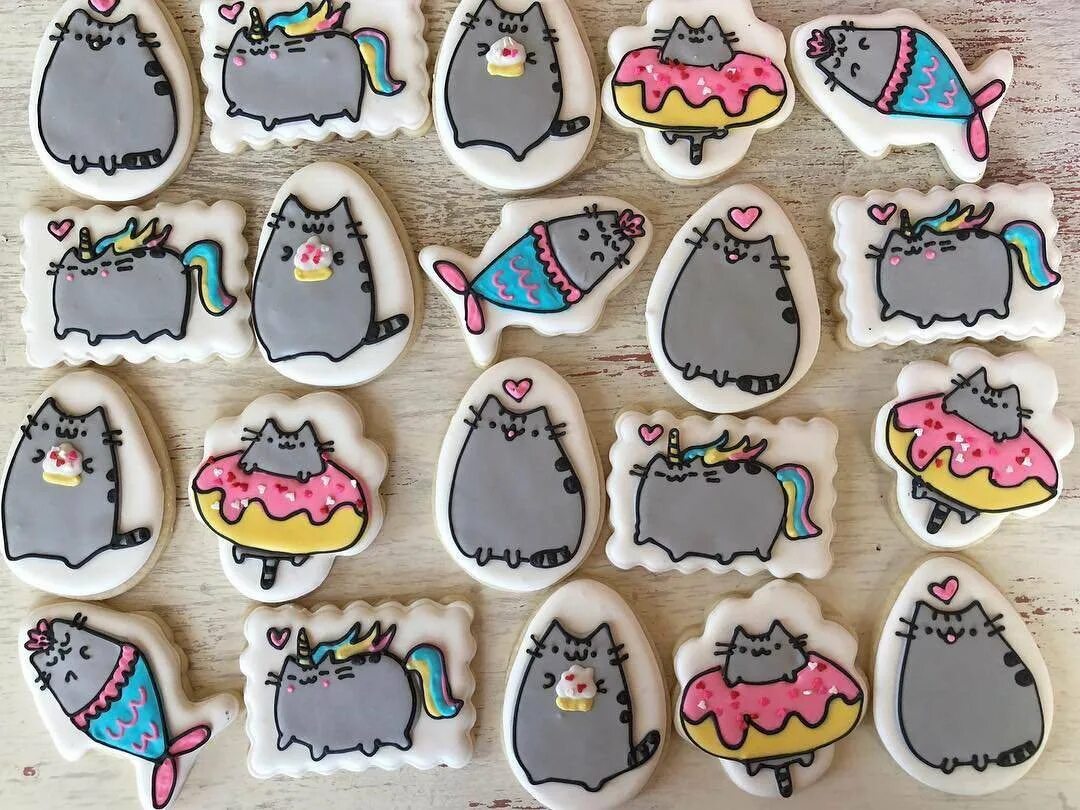 Киндер пушина. Пряники Pusheen. Капкейки кот Пушин. Пряник Пушин Кэт. Киндер Пушин Кэт.