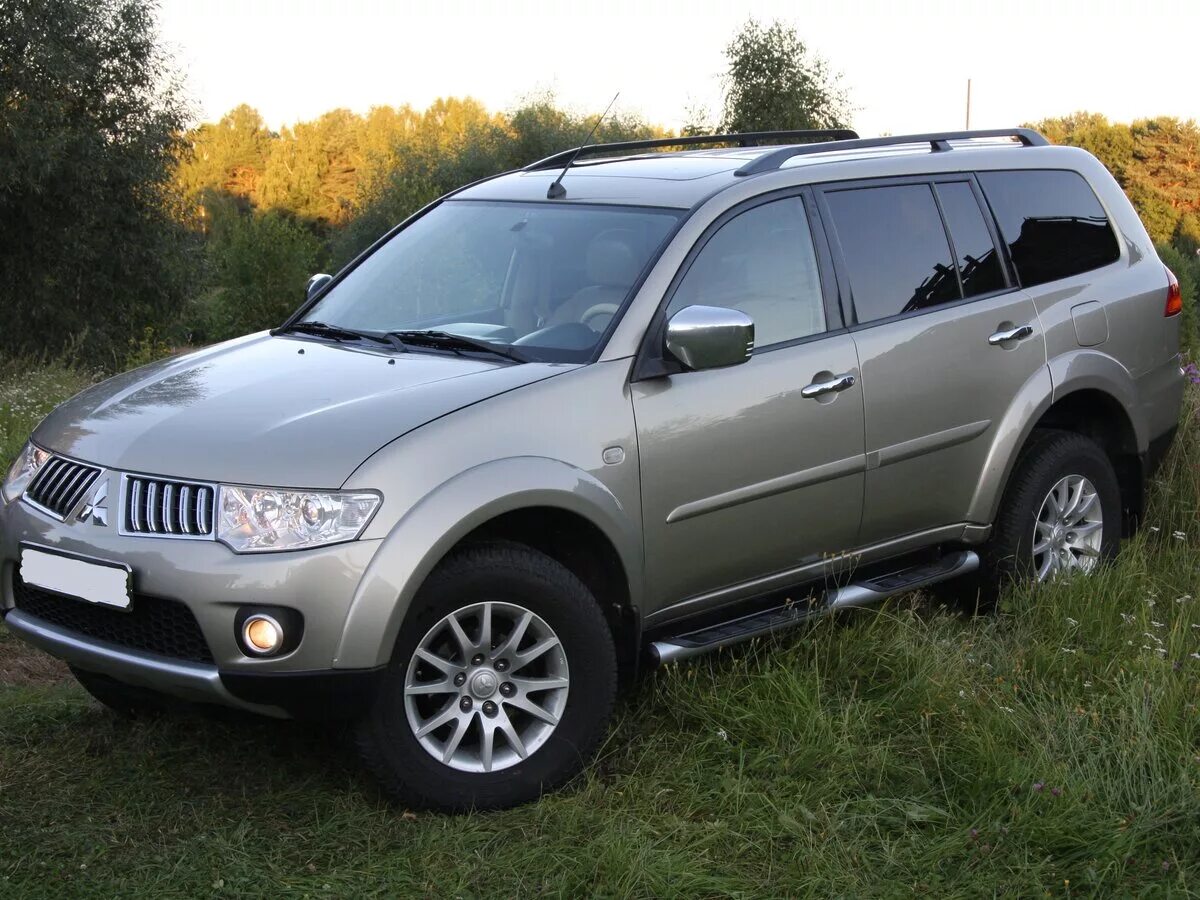 Mitsubishi pajero sport 2014. мицубиси паджеро спорт 2. Mitsubishi pajero sport 2010 года. Mitsubishi pajero sport 2012 года. митсубиши паджеро спорт 2013.