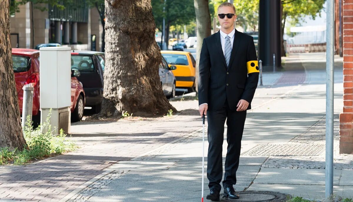 Blind man saving lady jogger