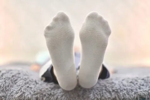 Feet in white socks