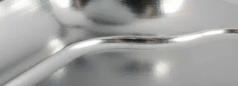 Слой олова на кастрюле
