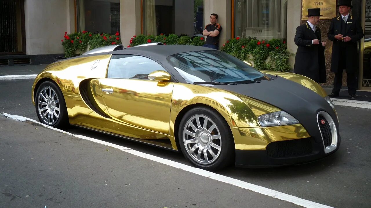 Expensive car перевод. Gold-Plated Bugatti Veyron. Машина Бугатти Золотая. Gold Bugatti Dorado. Most expensive Bugatti Veyron.