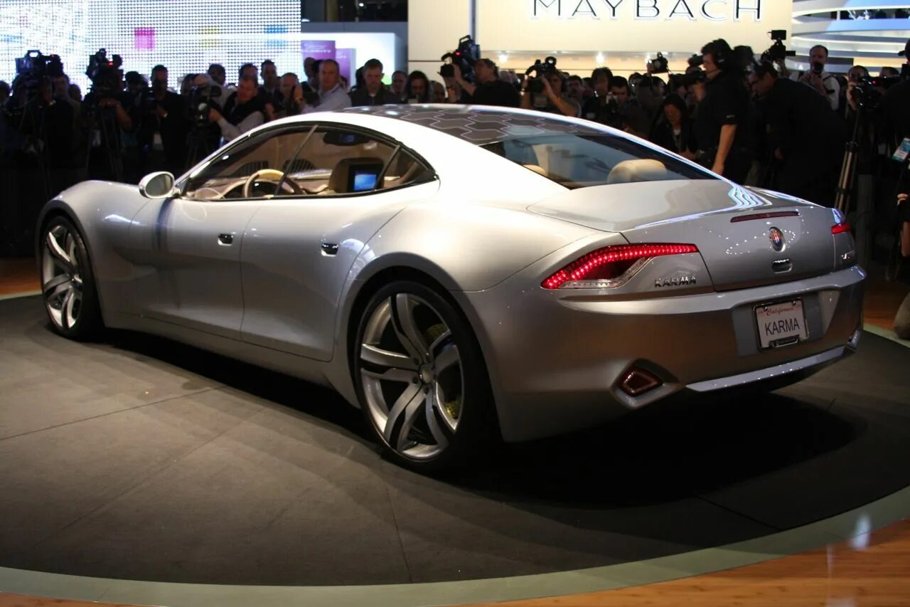 Карма цена. Тесла Фискер. Fisker Karma 2011. Fisker Karma 2009. Автомобиль карма Fisker.