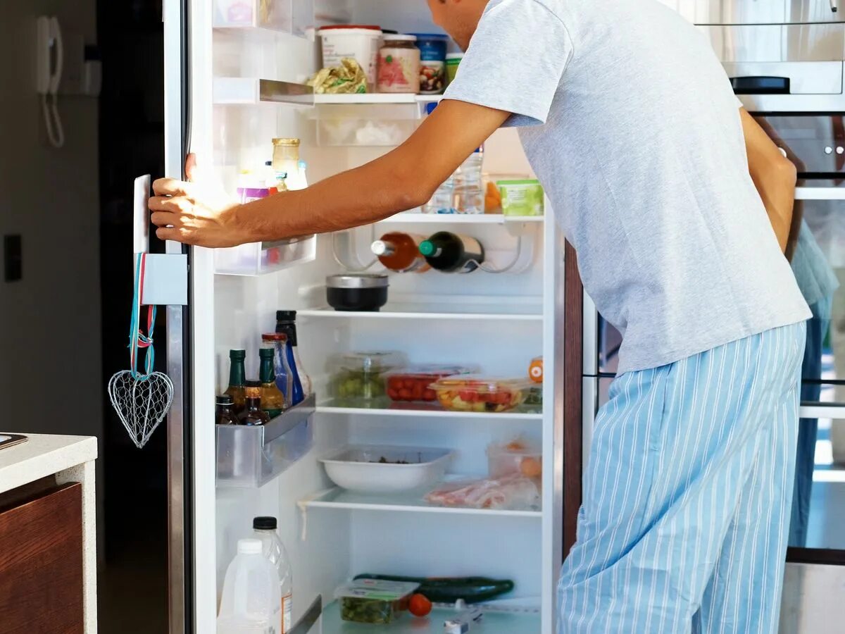 Next to the fridge