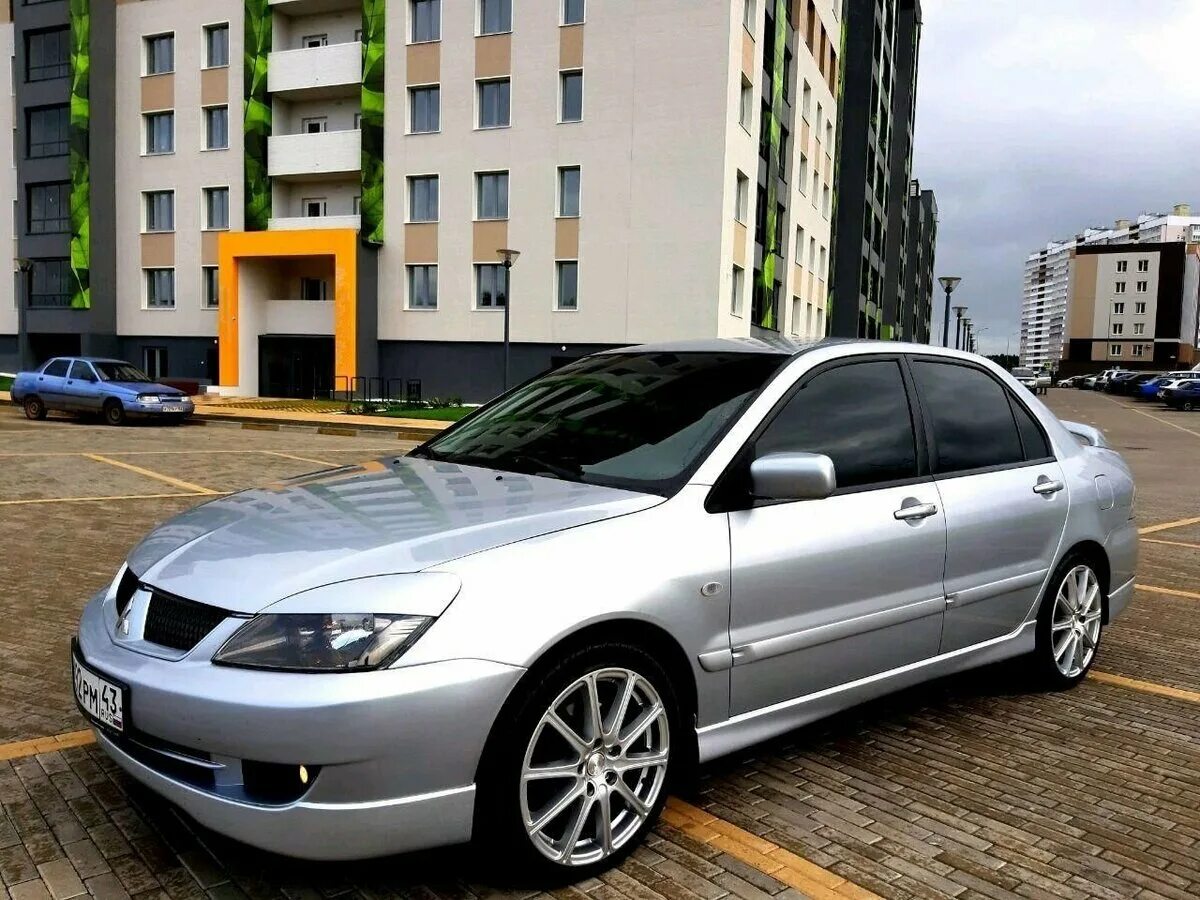 Группа лансер 9. Митсубиси Лансер 9. Mitsubishi Lancer 9 2006. Митсубиси Лансер 9 2.0. Мицубиси Лансер 9 Рестайлинг.