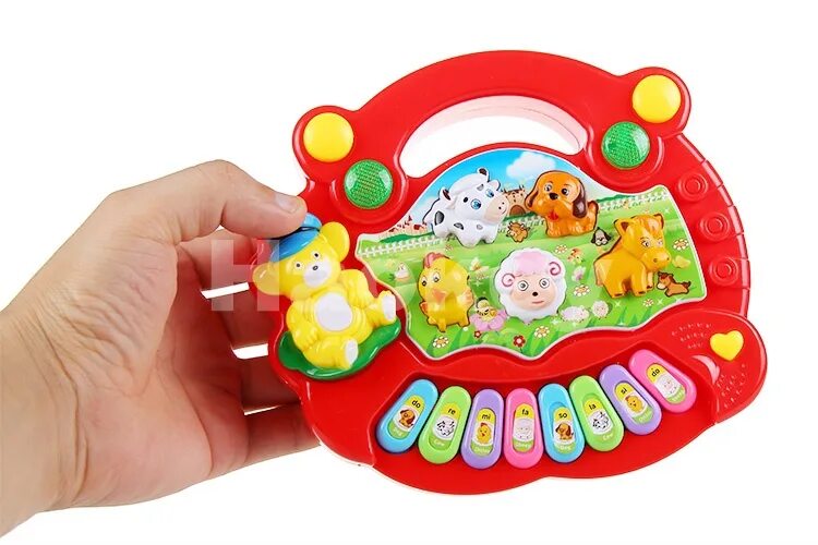 Игрушки со звуком. Яркая звучащая игрушка для детей. Музыкальная ферма игрушка. Музыкальное пианино с шариками для малышей.