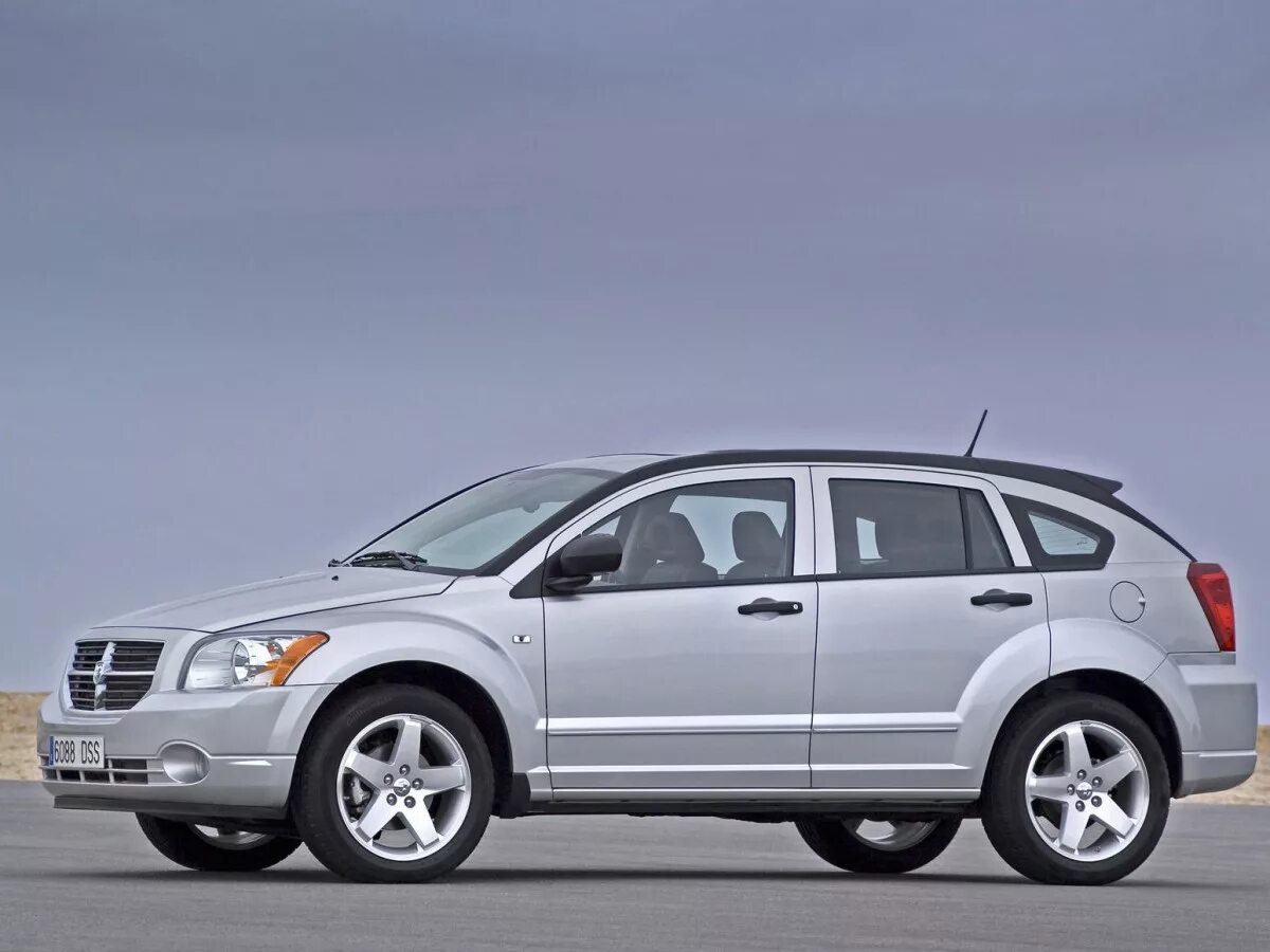 Dodge caliber 2.0. Додж Калибер 2006. Додж Калибр 2006. Додж Калибр 2013. Dodge Caliber (2006-2011).