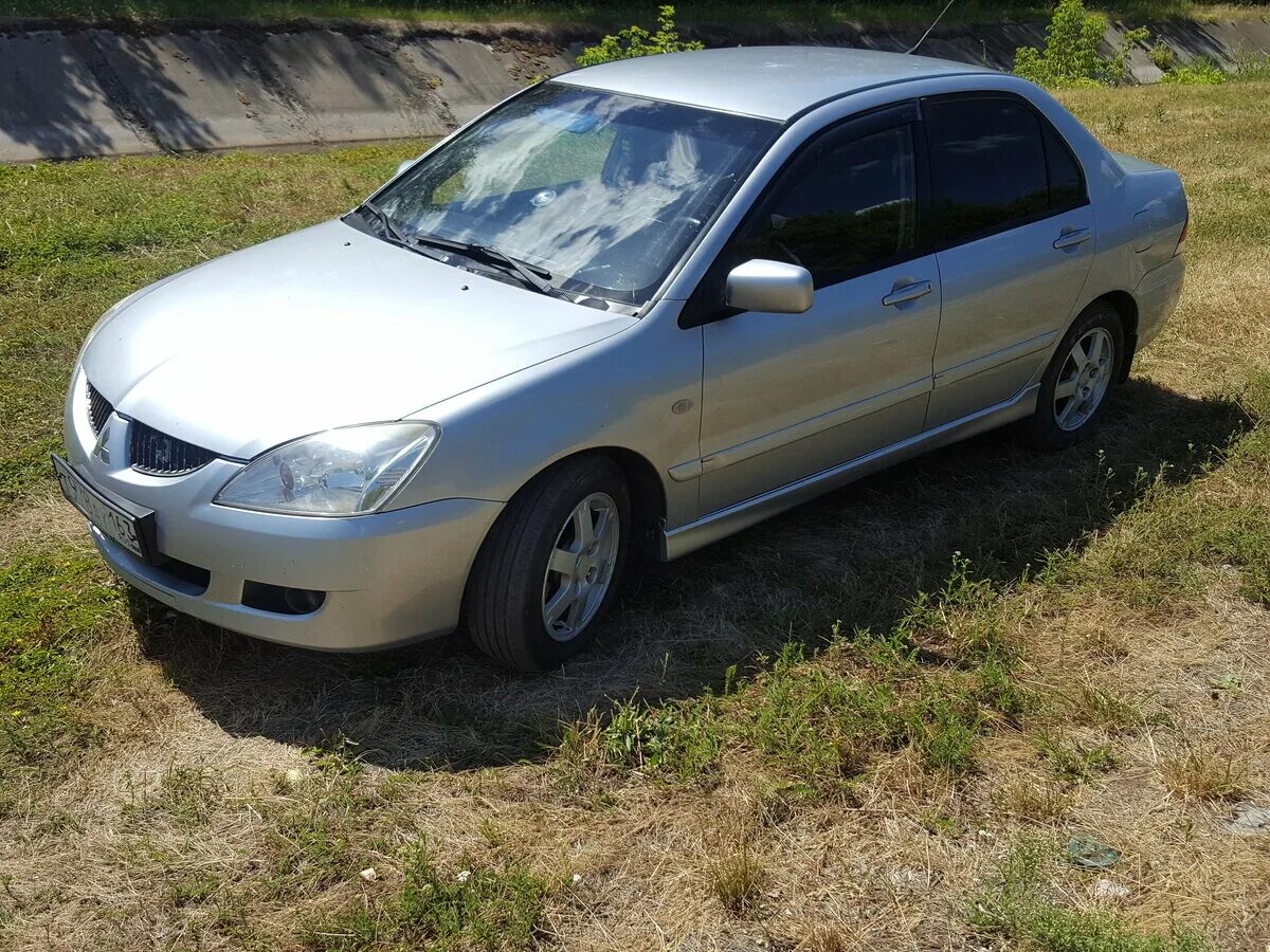 Mitsubishi lancer 2005. Mitsubishi Lancer IX 2005. Mitsubishi Lancer 9 2005. Митсубиси Лансер 2005.