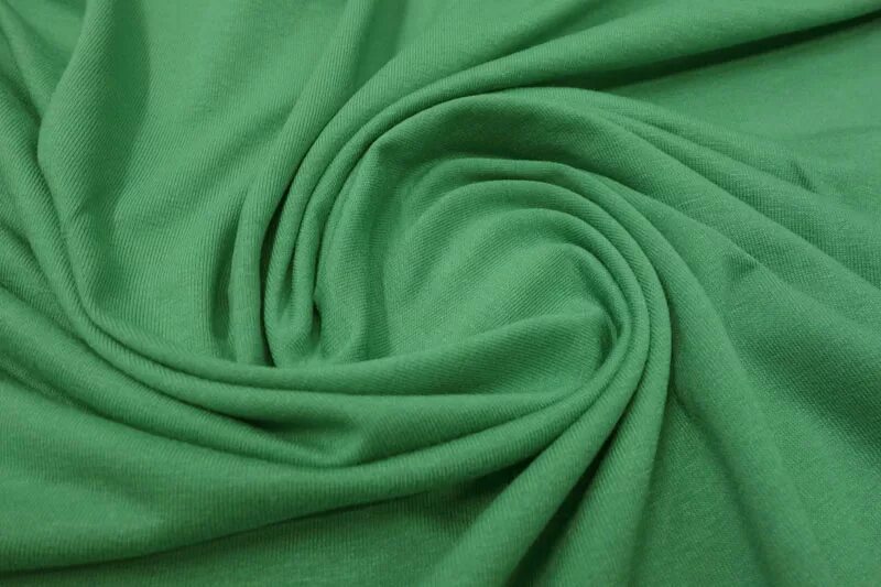 Зеленая ткань. Трикотажная ткань. Трикотаж ткань. Трикотажное полотно.