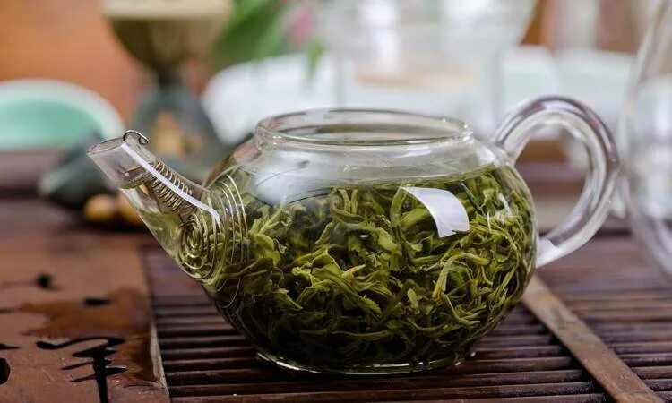 Зеленый чай мочегонный или нет. Китайский травяной чай. Китайский чай зеленая улитка. Элитный китайский чай. Зелёный чай мочегонный.