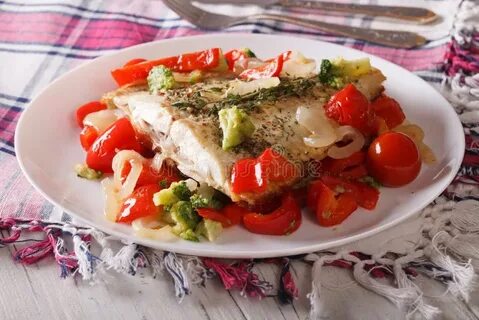 Рецепт камбалы в духовке с овощами
