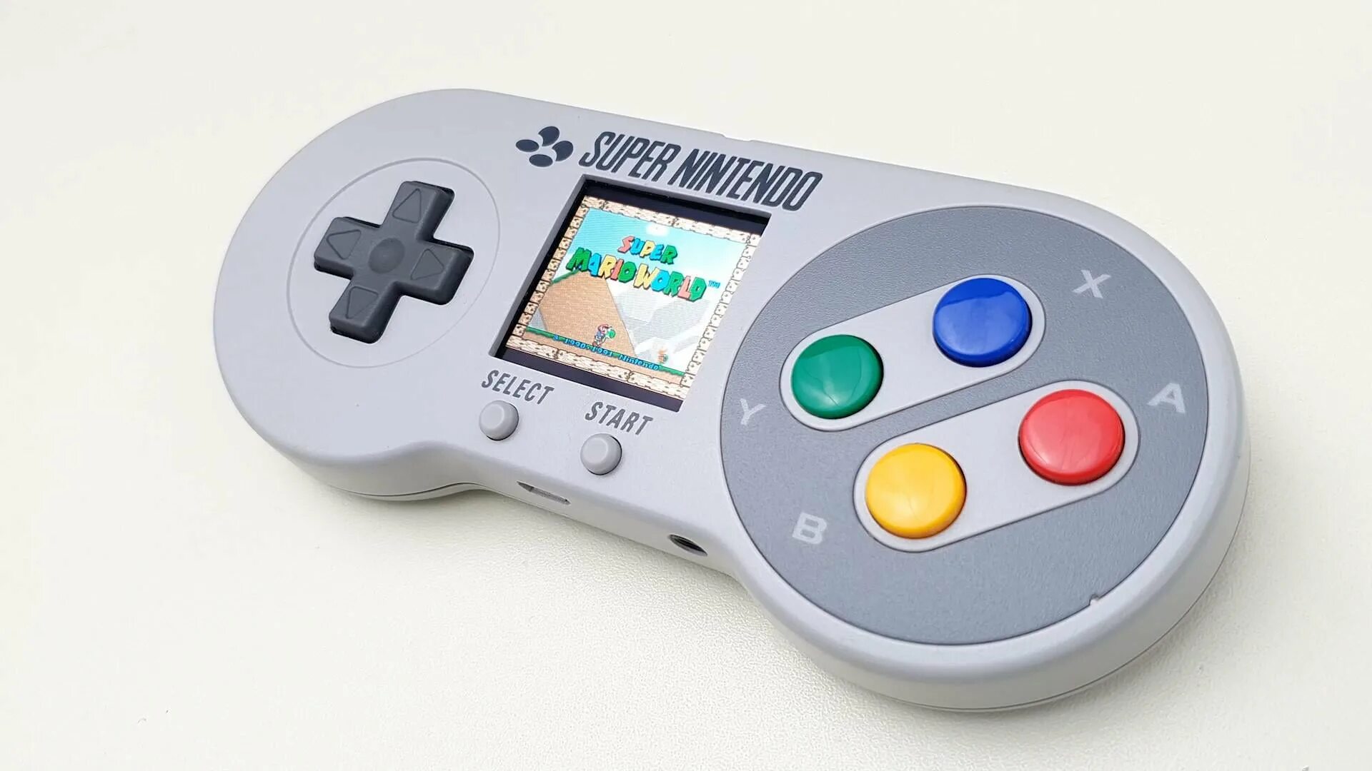 Super famicom. Портативная консоль Nintendo 64. Super Nintendo контроллер. Нинтендо супер Нинтендо. Super Famicom джойстик.