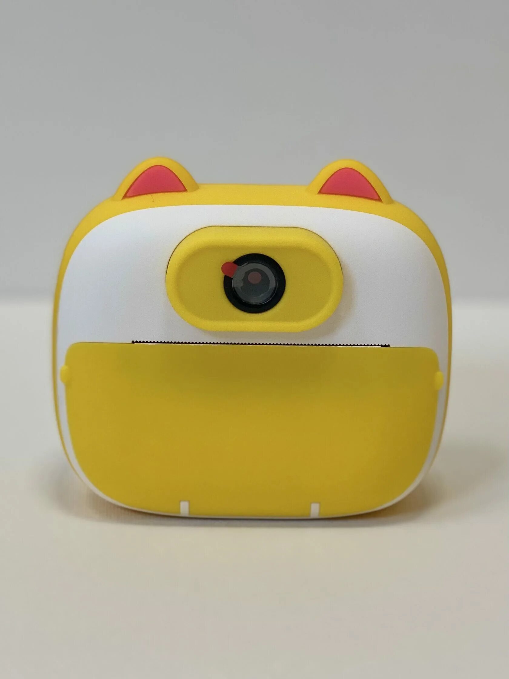 как вставить бумагу в детский фотоаппарат моментальной