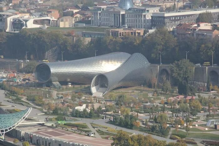 Centre tbilisi. Культурный центр Тбилиси. Community Centre Тбилиси. Недостроенный театр в Тбилиси. Культурно развлекательный центр в Тбилиси.