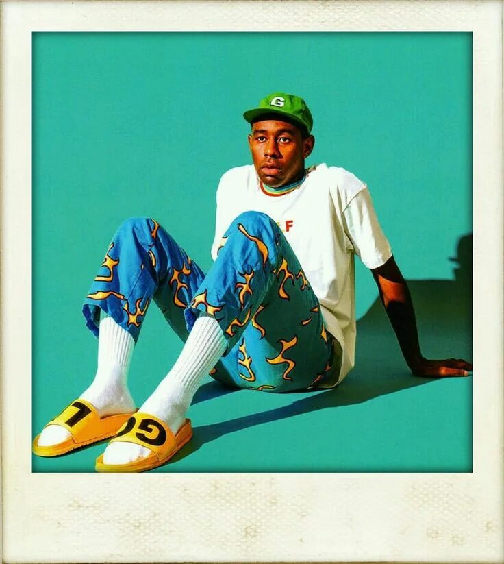 Like him tyler the creator перевод. Tyler the creator album. tyler the creator в фиолетовом. tyler the creator альбом с телефоном.