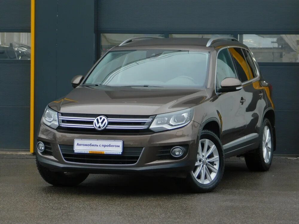 Volkswagen tiguan 2014. Фольксваген Тигуан Рестайлинг 2014. Volkswagen Тигуан 2014. Машина Фольксваген Тигуан 2014. Фольксваген Тигуан 2014 1,4.