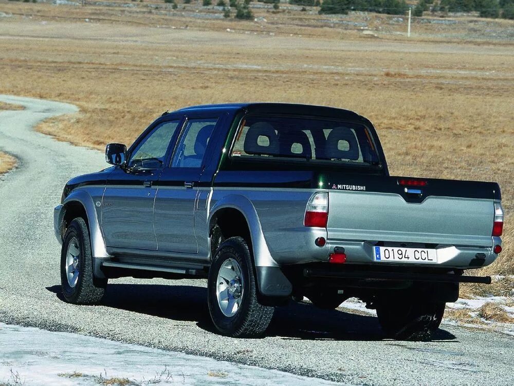 Л 200 поколения. Mitsubishi l200 пикап. Митсубиси л200 3 поколение. Mitsubishi l200 6 поколение. Mitsubishi l200 3 поколение.