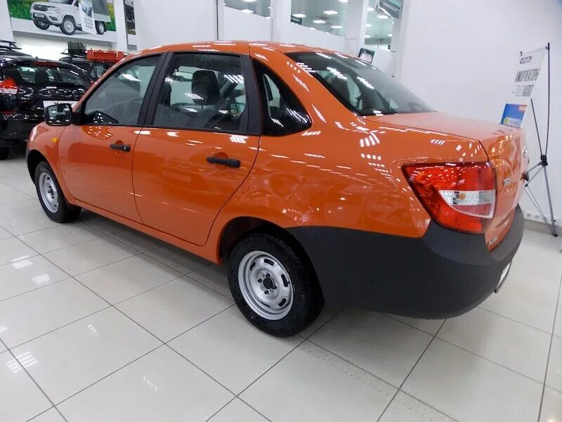 Лада гранта 2015 год цвет ладога. Лада гранта фл седан стандарт. Лада гранта персей седан. 672 цвет гранта. Лада ваз гранта синий.