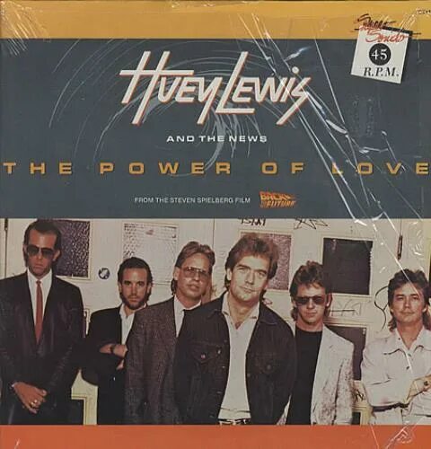 Хью льюис и группа the news. Huey lewis the news power of love. Хьюи льюис. Huey lewis &the news power of love the певица. Huey lewis & the news.