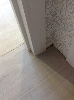 Переход ламината из комнаты в комнату